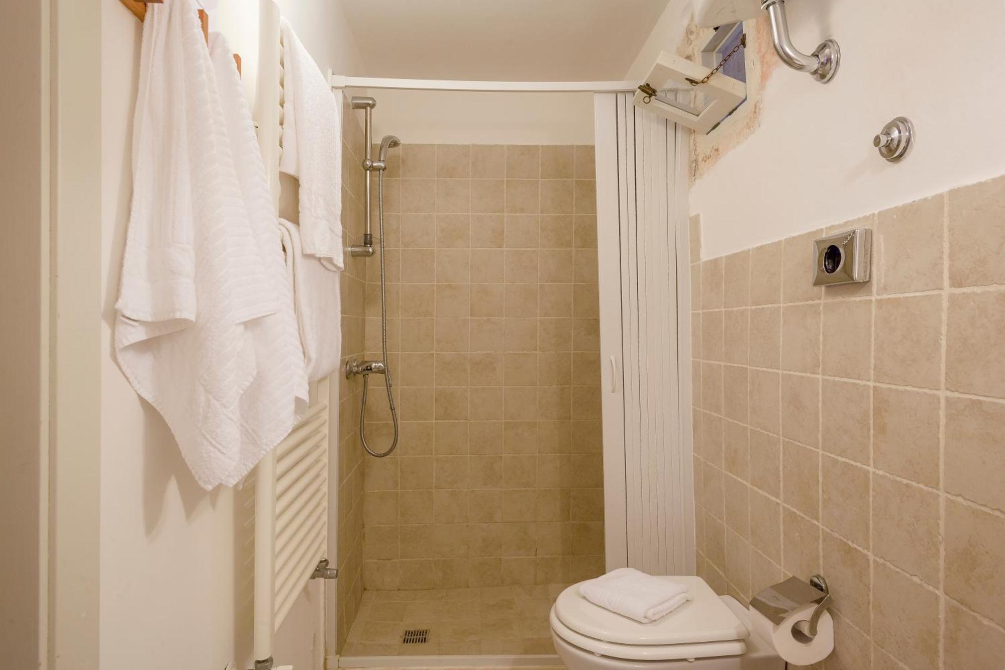 Chambre Quadruple avec Salle de Bains Privative